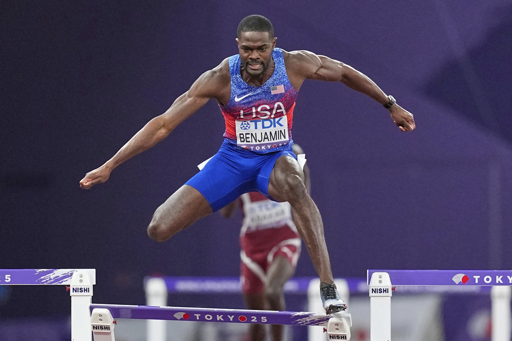 United States' Rai Benjamin hits the final hurdle but still wins the gold medal in the men's 400 meters hurdles final at the World Athletics Championships in Tokyo, Friday, Sept. 19, 2025. (AP Photo/Petr David Josek)