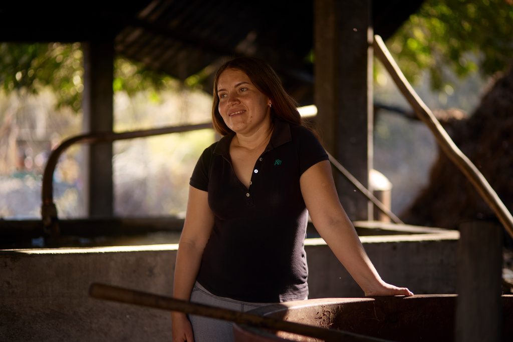 Gladys Sánchez Garnica, a mezcal producer, poses at a distillery in San Pedro Totolapam, Oaxaca, Mexico, Wednesday, Jan. 21, 2026. (AP Photo/Claudia Rosel)