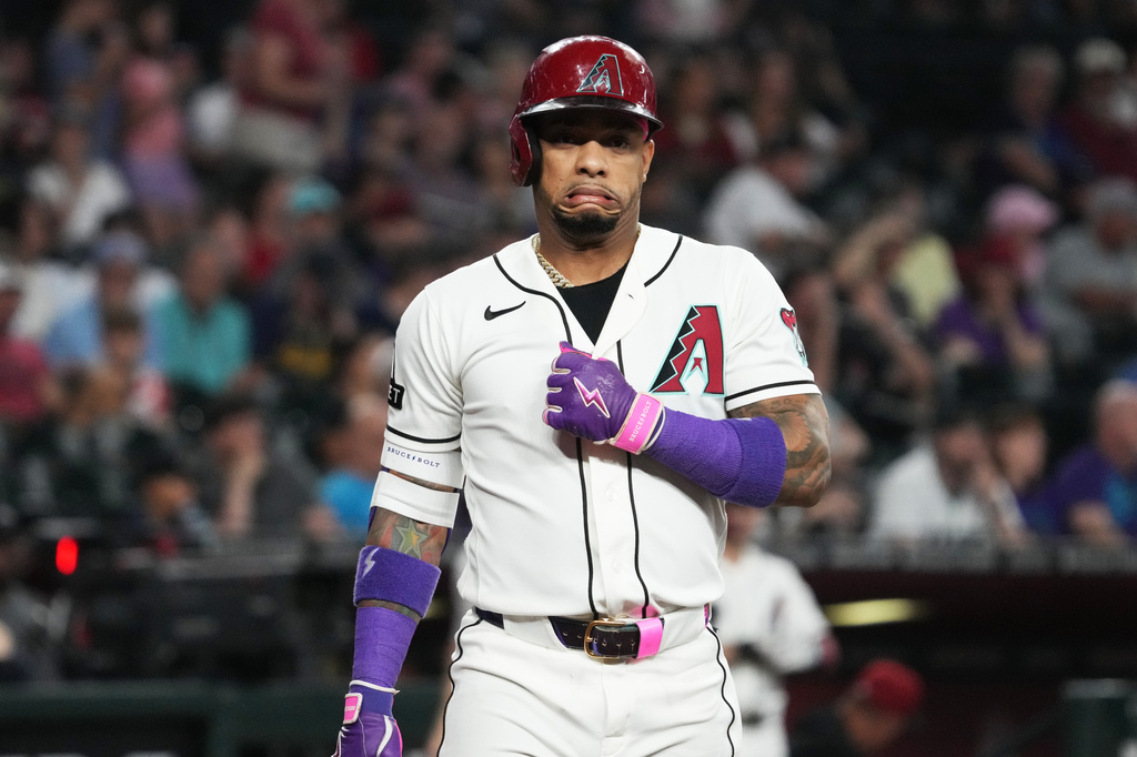 Arizona Diamondbacks' Ketel Marte reacts after a wild pitch in the first inning of a baseball game against the Milwaukee Brewers, Sunday, July 5, 2026, in Phoenix. (AP Photo/Rick Scuteri)