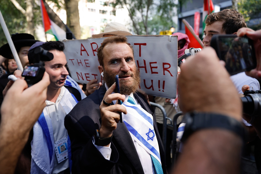 Rabbi Shmuley Boteach confronts pro-Palestinian demonstrators outside United Nations headquarters, Friday, Sept. 26, 2025, in New York. (AP Photo/Stefan Jeremiah)