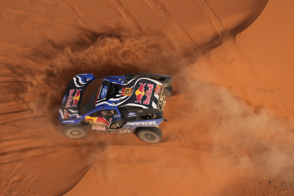 Driver Mattias Ekstrom and co-driver Emil Bergkvist compete during the second stage of the Dakar Rally between Yanbu and Alula, Saudi Arabia, Monday, Jan. 5, 2026. (AP Photo/Thibault Camus)