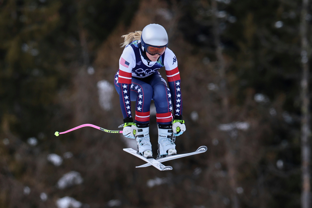 United States' Lindsey Vonn speeds down the course during an alpine ski, women's downhill official training, at the 2026 Winter Olympics, in Cortina d'Ampezzo, Italy, Friday, Feb. 6, 2026. (AP Photo/Marco Trovati)