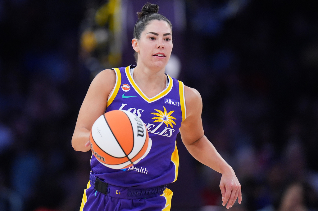 FILE - Los Angeles Sparks guard Kelsey Plum dribbles during the second half of a WNBA basketball game against the Indiana Fever, May 13, 2026, in Los Angeles. (AP Photo/Jae C. Hong, File)
