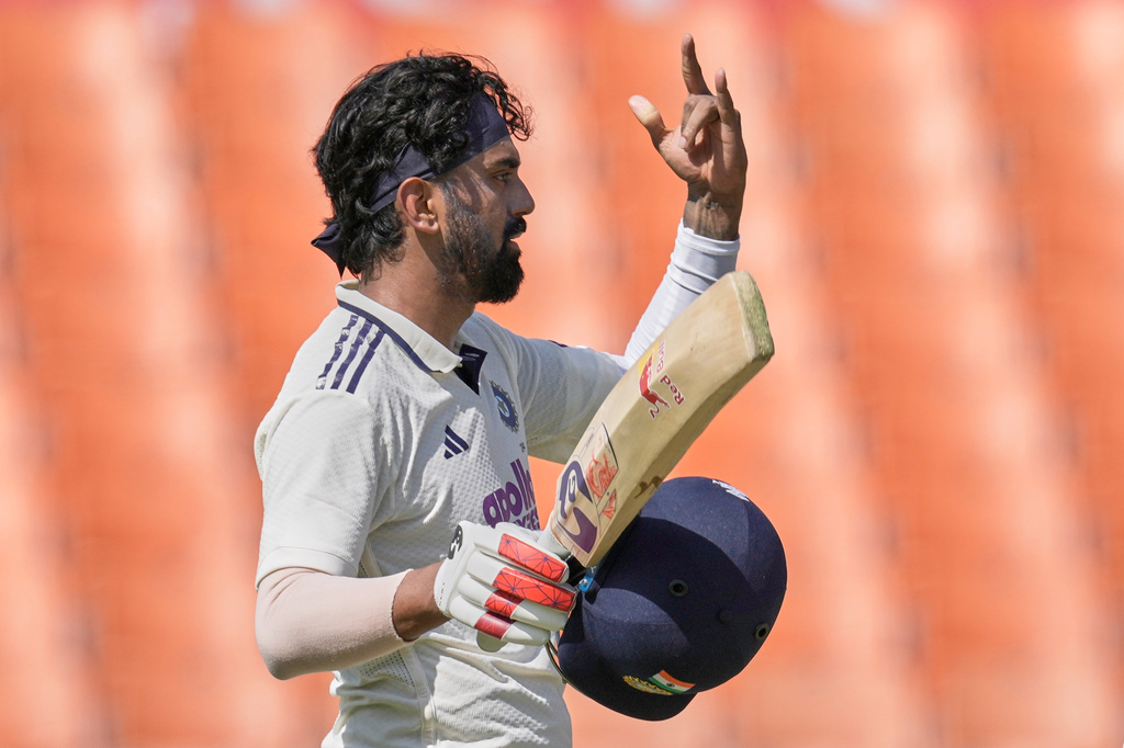 India's KL Rahul celebrates his century on day one of the cricket test match between Afghanistan and India in New Chandigarh, India, Saturday, June 6, 2026. (AP Photo/Ashwini Bhatia)