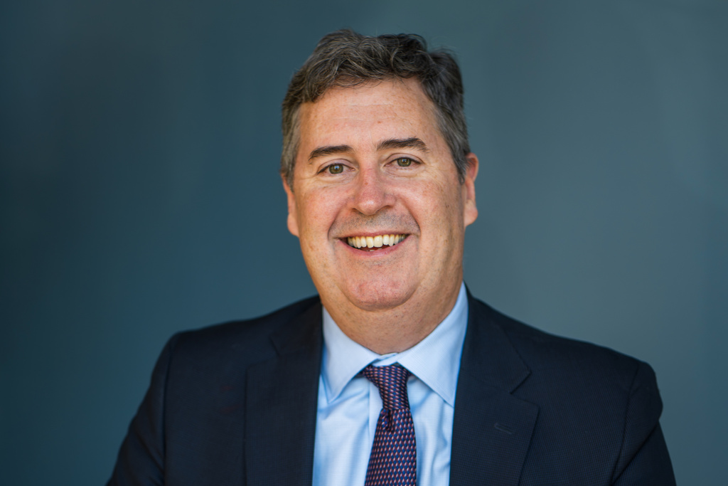 This photo provided by Joel Brennan's campaign shows Democratic candidate for Wisconsin governor Joel Brennan posing for a portrait in Milwaukee, Nov. 14, 2025. (Joel Brennan for Governor campaign via AP)