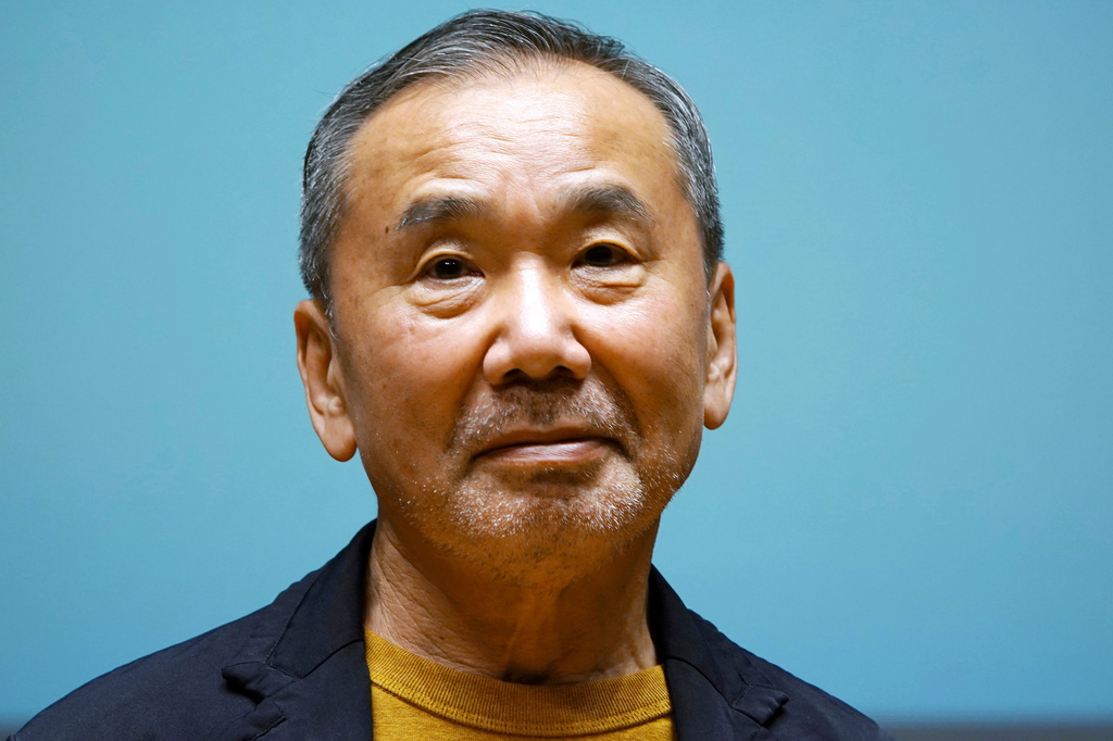 FILE - Japanese novelist Haruki Murakami poses for media during a press conference on the university's new international house of literature, The Haruki Murakami Library, opening at the Waseda University in Tokyo, on Sept. 22, 2021. (AP Photo/Eugene Hoshiko, File)