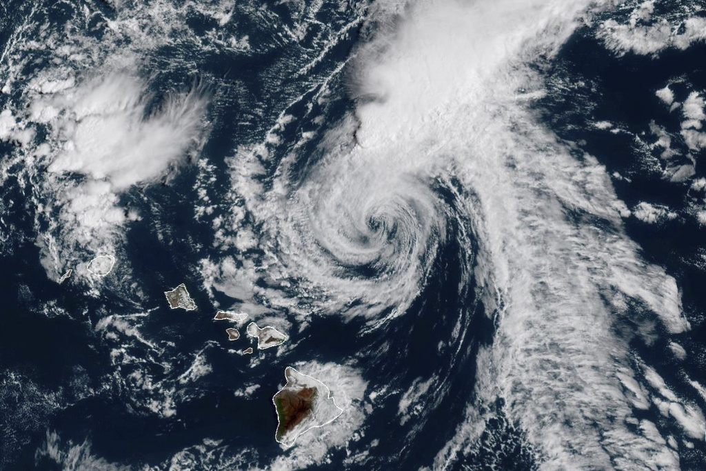 This GOES-West GeoColor satellite image taken Tuesday, Sept. 9, 2025, at 5 p.m. EDT and provided by NOAA, shows tropical storm Kiko churning north of Hawaii. (NOAA via AP)
