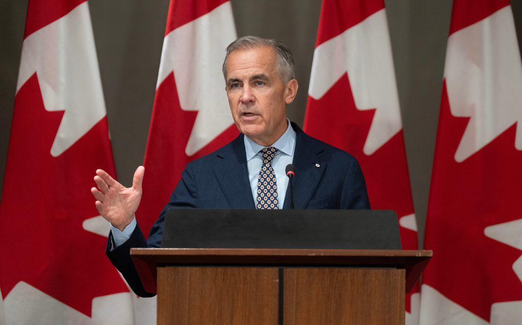 Prime Minister Mark Carney addresses caucus in Ottawa, Friday, Sept. 18, 2026. (Adrian Wyld/The Canadian Press via AP)