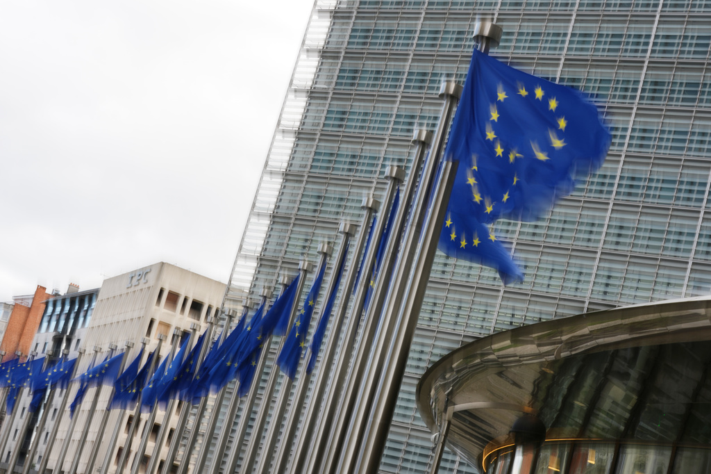 European Union flags flap in the wind outside EU headquarters in Brussels, Tuesday, May 12, 2026. (AP Photo/Virginia Mayo)