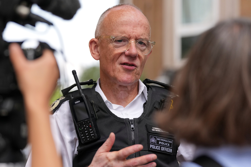 Mark Rowley, Commissioner of Police of the Metropolis, is interviewed after a walkabout through the borough of Camden in London, Thursday, July 23, 2026. (AP Photo/Kirsty Wigglesworth)
