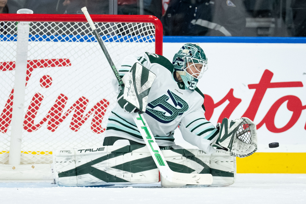 Boston Fleet goaltender Aerin Frankel (31) stops the puck against the Vancouver Goldeneyes during the second period of a PWHL game in Vancouver, on Tuesday, March 10, 2026. (Ethan Cairns/The Canadian Press via AP)
