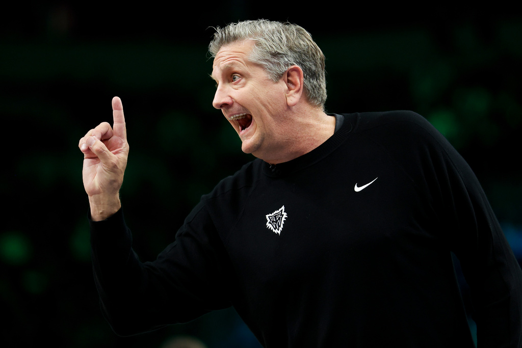 Minnesota Timberwolves head coach Chris Finch shouts from the sideline during the first half of an NBA basketball game against the Houston Rockets, Wednesday, March 25, 2026, in Minneapolis. (AP Photo/Ellen Schmidt)