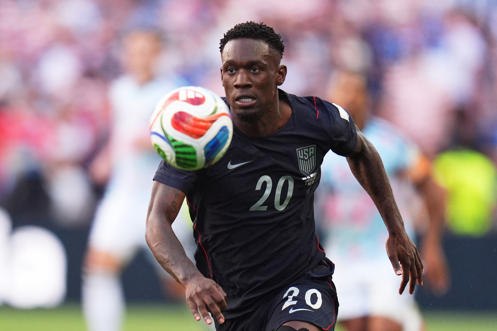 United States' Folarin Balogun goes for the ball during the World Cup round of 16 soccer match against Belgium in Seattle, Monday, July 6, 2026. (AP Photo/Manu Fernandez)