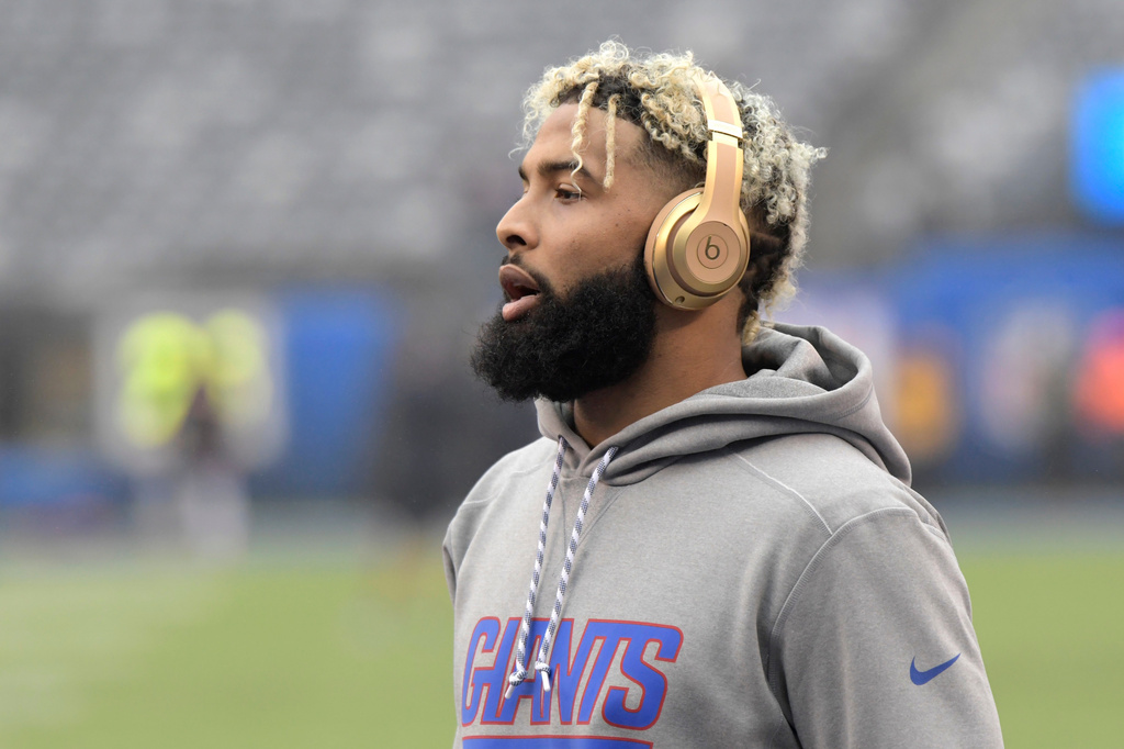 FILE - New York Giants wide receiver Odell Beckham warms up prior to an NFL football game against the Chicago Bears, Dec. 2, 2018, in East Rutherford, N.J. (AP Photo/Bill Kostroun, file)