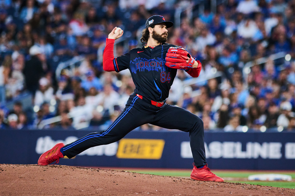 Toronto Blue Jays' Dylan Cease works against the Seattle Mariners during the third inning of a baseball game in Toronto, Friday, Aug. 28, 2026. (Sammy Kogan/The Canadian Press via AP)