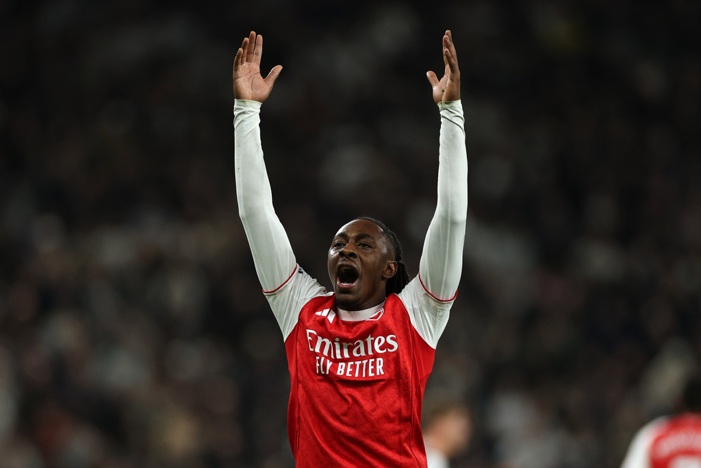 Arsenal's Eberechi Eze celebrates scoring his side's third goal during the English Premier League soccer match between Tottenham Hotspur and Arsenal in London, Sunday, Feb. 22, 2026.(AP Photo/Ian Walton)