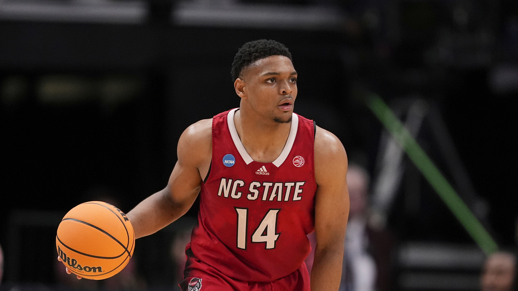 FILE - North Carolina State guard Casey Morsell dribbles the ball during a Sweet 16 college basketball game against Marquette in the NCAA Tournament in Dallas, March 29, 2024. (AP Photo/Tony Gutierrez, file)