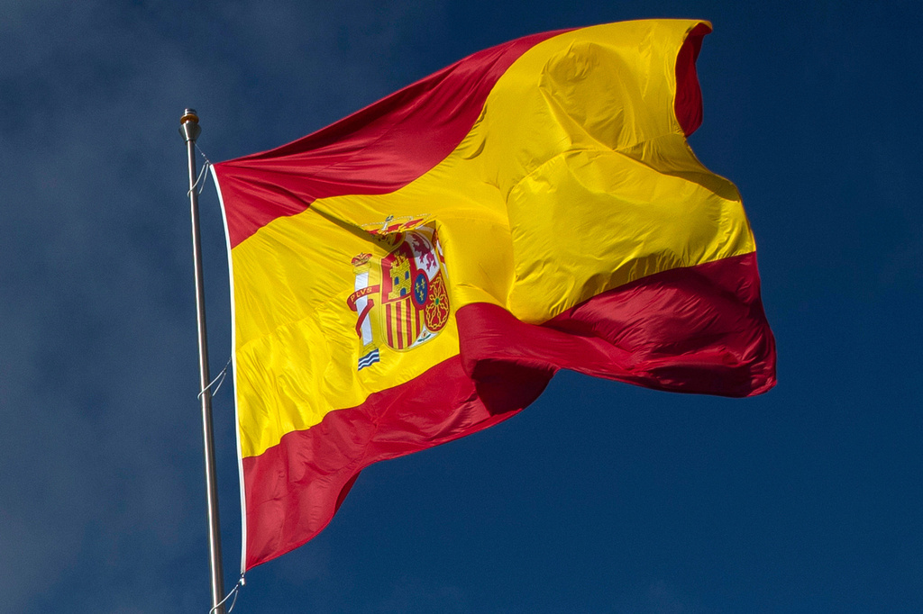 FILE - The Spanish flag flies in Madrid, Spain, Friday, Oct. 23, 2020. (AP Photo/Manu Fernandez, File)