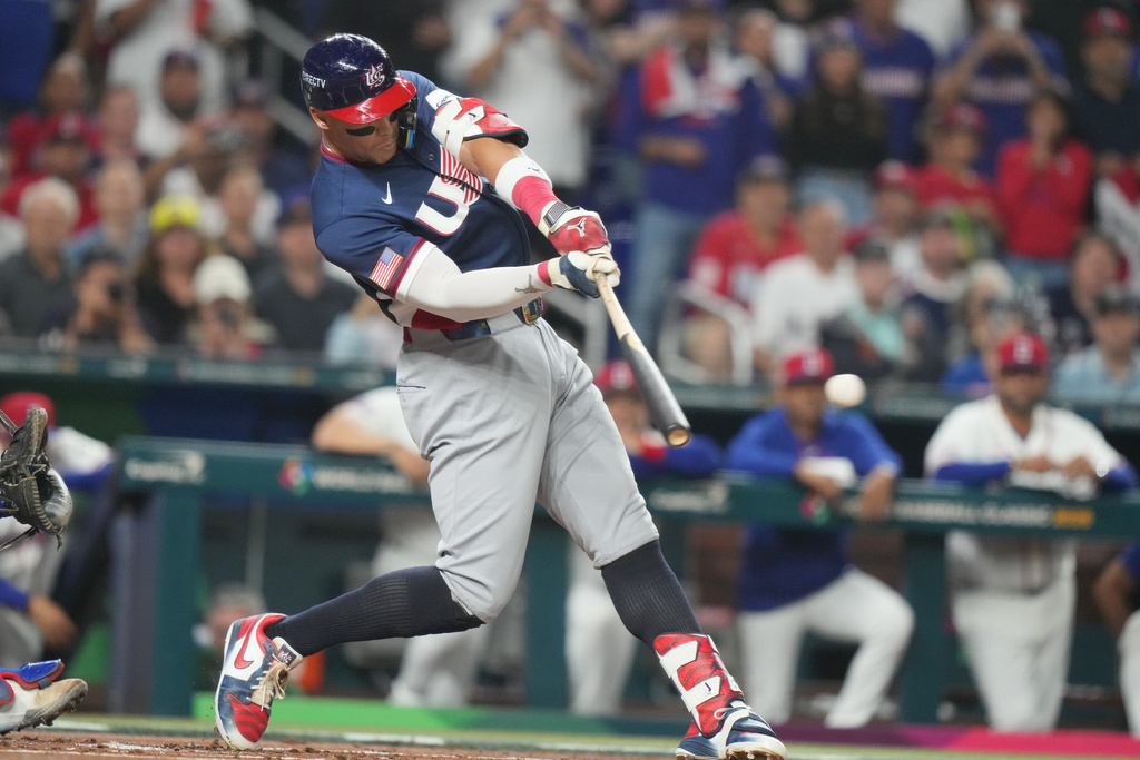 United States' Aaron Judge (99) hits a single during the first inning of a World Baseball Classic semifinal game against the Dominican Republic, Sunday, March 15, 2026, in Miami. (AP Photo/Lynne Sladky)