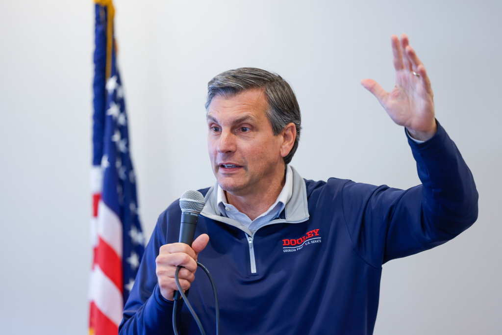 Republican U.S. Senate candidate Derek Dooley speaks at a campaign stop at Farmview Market in Madison, Ga., on May 8, 2026. (Arvin Temkar/Atlanta Journal-Constitution via AP)