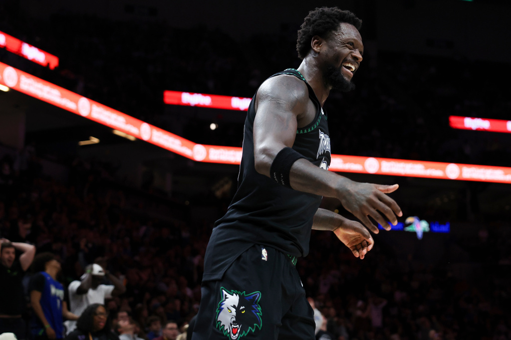 Minnesota Timberwolves forward Julius Randle reacts during the second half of an NBA basketball game against the Houston Rockets, Wednesday, March 25, 2026, in Minneapolis. (AP Photo/Ellen Schmidt)