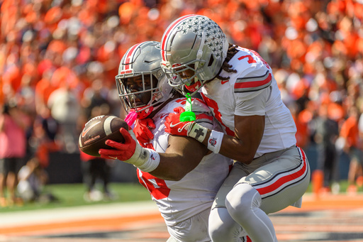 Ohio State defensive lineman Kayden McDonald (98) and cornerback Jermaine Mathews Jr. (7) celebrate a fumble recovery during the first half of an NCAA college football game against Illinois, Saturday, Oct. 11, 2025, in Champaign, Ill. (AP Photo/Craig Pessman) Ohio State defensive lineman Kayden McDonald (98) and cornerback Jermaine Mathews Jr. (7) celebrate a fumble recovery during the first half of an NCAA college football game against Illinois, Saturday, Oct. 11, 2025, in Champaign, Ill. (AP Photo/Craig Pessman)