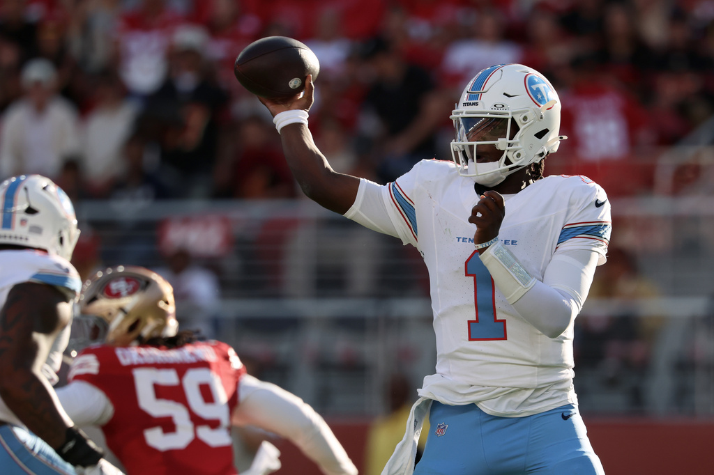 Tennessee Titans quarterback Cam Ward (1) passes against the San Francisco 49ers during the first half of a preseason NFL football game, Thursday, Aug. 13, 2026, in Santa Clara, Calif. (AP Photo/Jed Jacobsohn)
