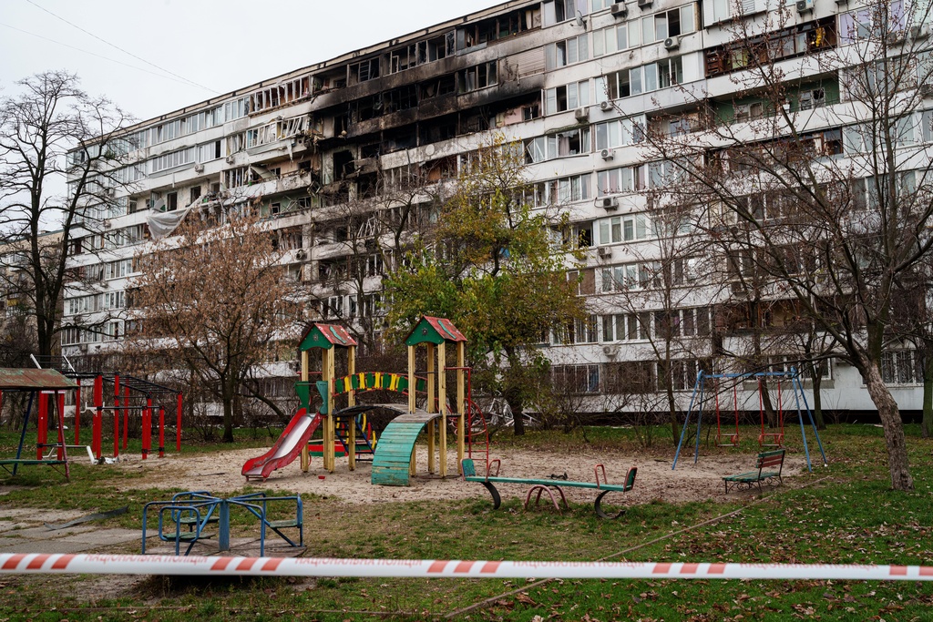 A residential building is seen heavily damaged after a Russian strike on Kyiv, Ukraine, on Tuesday, Nov. 25, 2025. (AP Photo/Evgeniy Maloletka)