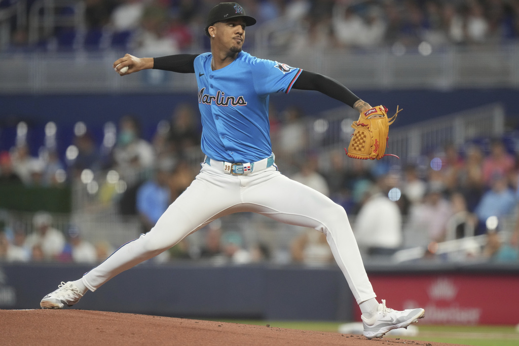 Miami Marlins starting pitcher Eury Pérez aims a pitch during the first inning of a baseball game against the Toronto Blue Jays, Sunday, Aug. 24, 2025, in Miami. (AP Photo/Marta Lavandier)