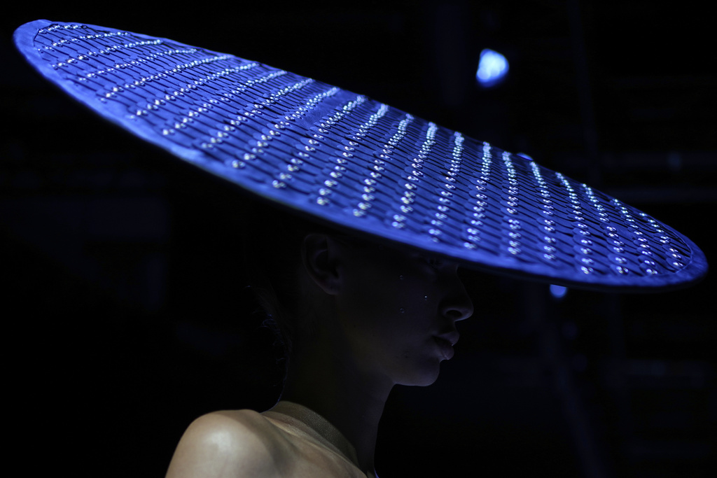 A model wears a creation by Brazilian brand Artemisi on a runway at the Moscow Fashion Week in Moscow, Russia, Friday, Aug. 29, 2025. (AP Photo/Pavel Bednyakov)