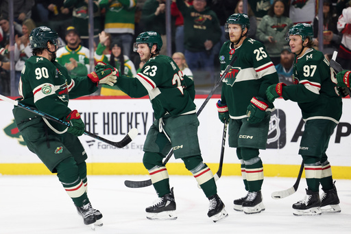 Minnesota Wild center Marco Rossi (23) celebrates with his teammates after scoring a goal during the first period of an NHL hockey game against the San Jose Sharks, Sunday, Oct. 26, 2025, in St. Paul, Minn. (AP Photo/Ellen Schmidt) Minnesota Wild center Marco Rossi (23) celebrates with his teammates after scoring a goal during the first period of an NHL hockey game against the San Jose Sharks, Sunday, Oct. 26, 2025, in St. Paul, Minn. (AP Photo/Ellen Schmidt)