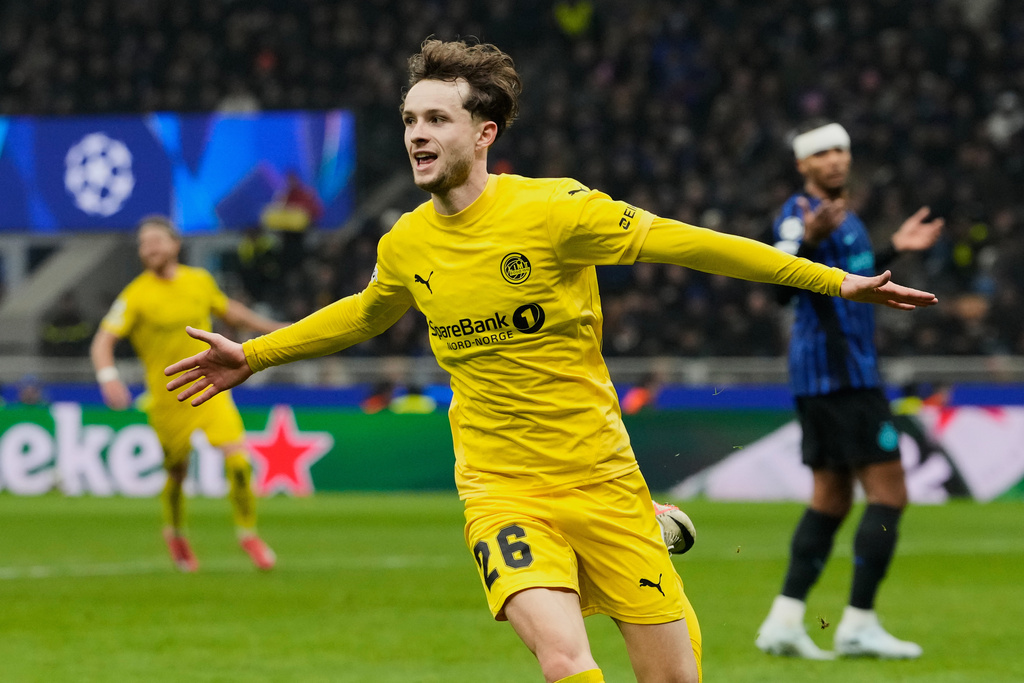 Glimt's Hakon Evjen celebrates after scoring his side's second goal during a Champions League playoff soccer match between Inter Milan and Bodo Glimt, at the San Siro stadium in Milan, Italy, Tuesday, Feb.24, 2026. (AP Photo/Luca Bruno)