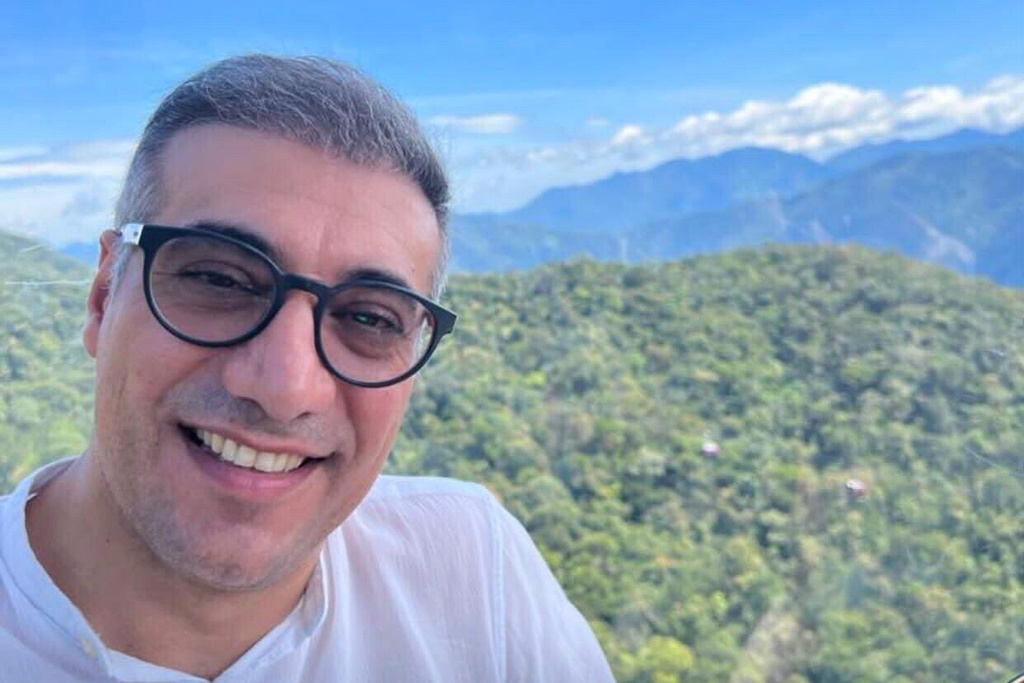 This undated photo provided by the Valizadeh family shows Reza Valizadeh posing for a photo. (Valizadeh Family via AP)