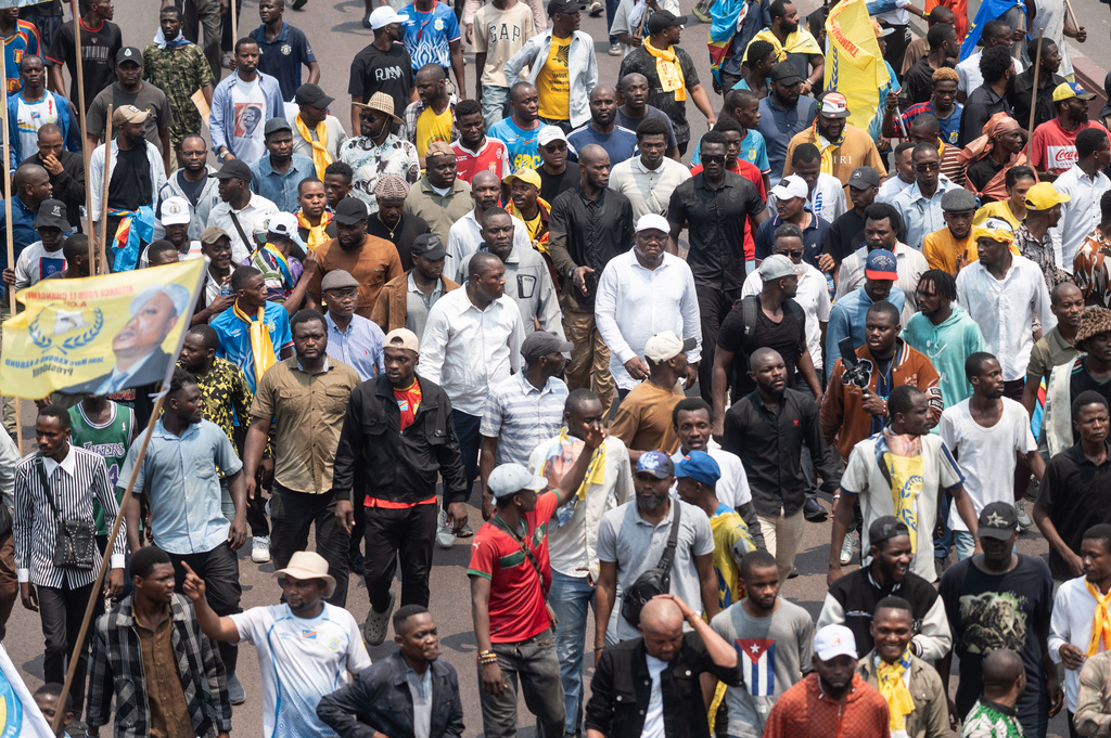People march during a protest organized by opposition parties against constitutional changes proposed by President Felix Tshisekedi, in Kinshasa, Congo, Tuesday, Sept. 15, 2026. (AP Photo/Samy Ntumba Shambuyi)