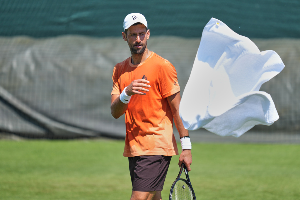 Novak Djokovic or Serbia attends a practice session ahead of the Wimbledon Tennis Championships, in London, Wednesday, June 24, 2026. (AP Photo/Kin Cheung)