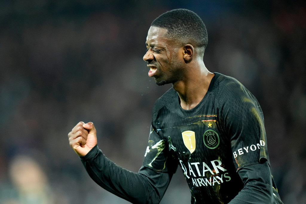 PSG's Ousmane Dembele celebrates after scoring his side's second goal during the first leg of the Champions League round of 16 soccer match between Paris Saint-Germain and Chelsea, in Paris, Wednesday, March 11, 2026. (AP Photo/Michel Euler)
