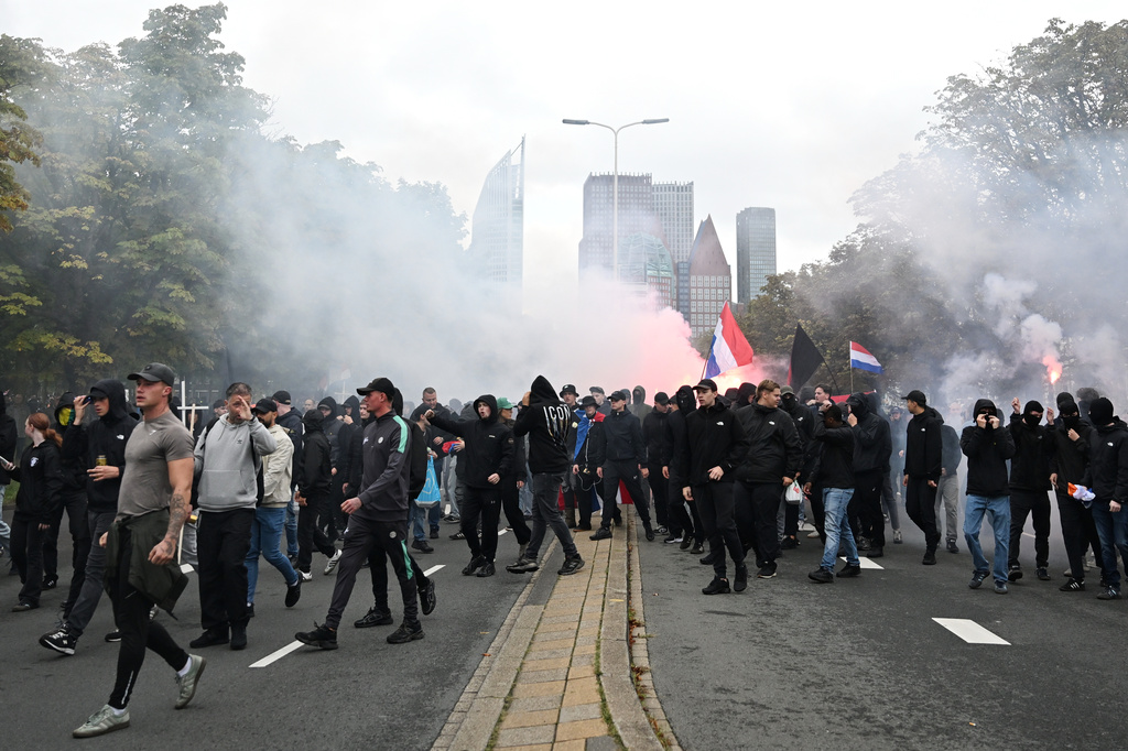 Protesters attend a far-right groups' protest against immigration and asylum policies, in The Hague, Netherlands, Saturday, Sept. 19, 2026. (AP Photo/Mouneb Taim)