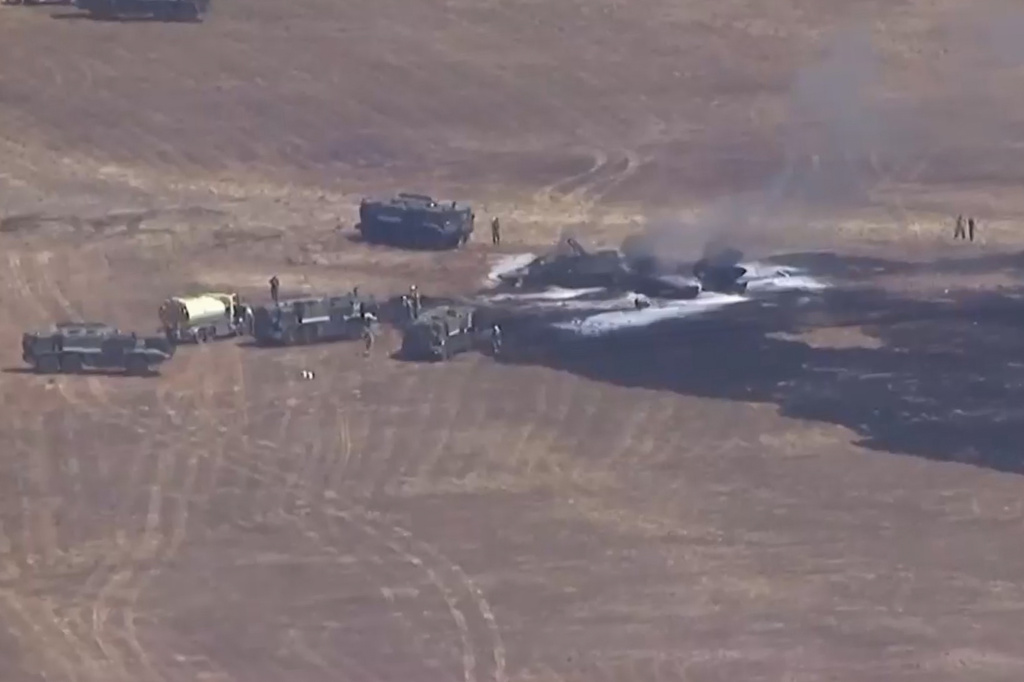 This image made from a video provided by KGTV shows the scene of an F-35 jet crash Friday, July 31, 2026, near the Miramar Air Base in San Diego. (KGTV via AP)
