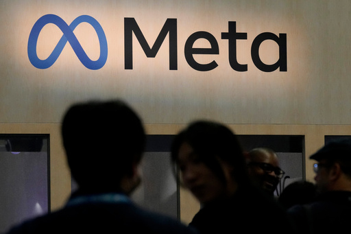 FILE - Attendees visit the Meta booth at the Game Developers Conference 2023 in San Francisco on March 22, 2023. (AP Photo/Jeff Chiu, File) FILE - Attendees visit the Meta booth at the Game Developers Conference 2023 in San Francisco on March 22, 2023. (AP Photo/Jeff Chiu, File)
