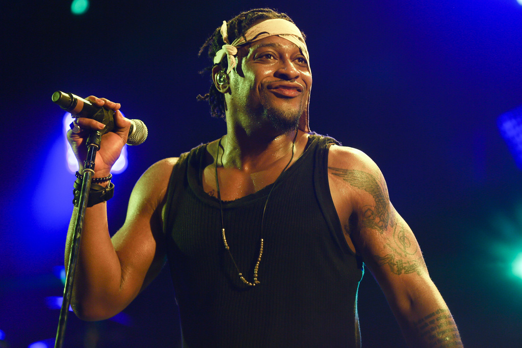 FILE - D'Angelo performs during FYF Fest in Los Angeles on Aug. 23, 2015. (Photo by Rich Fury/Invision/AP, File)