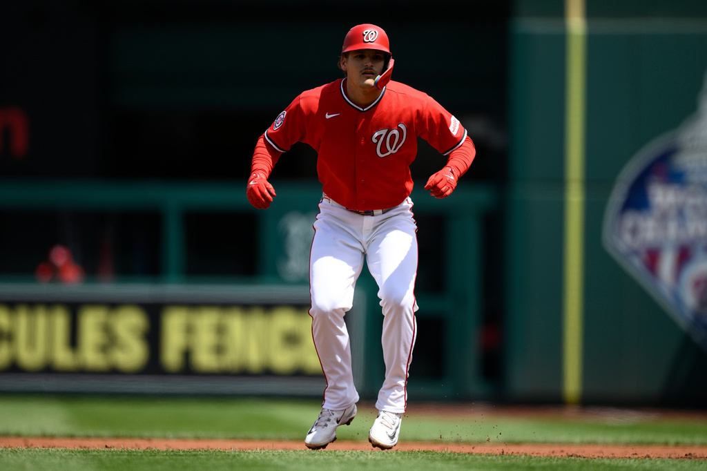Washington Nationals' Brady House takes a lead from first base during the first inning of a baseball game against the San Francisco Giants, Sunday, April 19, 2026, in Washington. (AP Photo/Nick Wass)