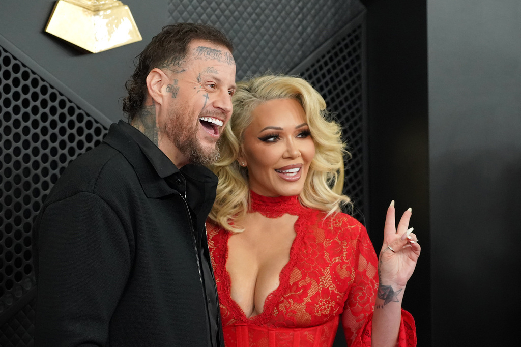 FILE - Jelly Roll, left, and Bunnie XO arrive at the 68th annual Grammy Awards, Feb. 1, 2026, in Los Angeles. (Photo by Jordan Strauss/Invision/AP, File)