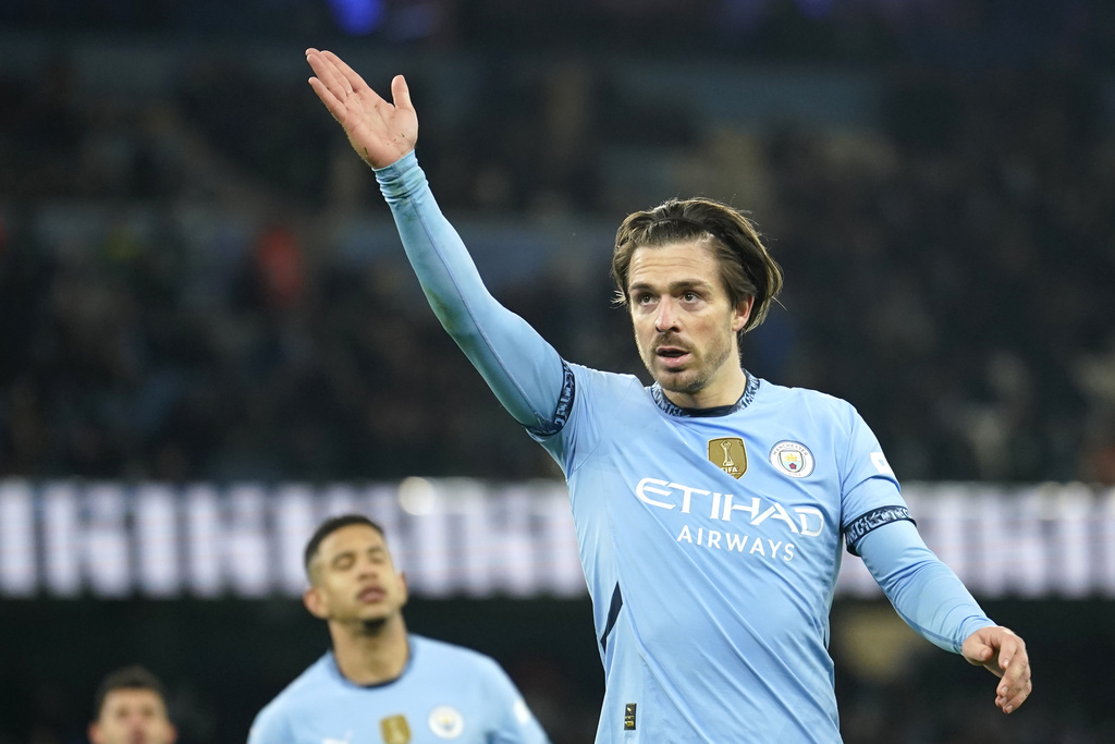 FILE - Manchester City's Jack Grealish celebrates after scoring his side's fourth goal during the English FA Cup soccer match between Manchester City and Salford City at Etihad Stadium in Manchester, Saturday, Jan. 11, 2025. (AP Photo/ Dave Thompson, file)