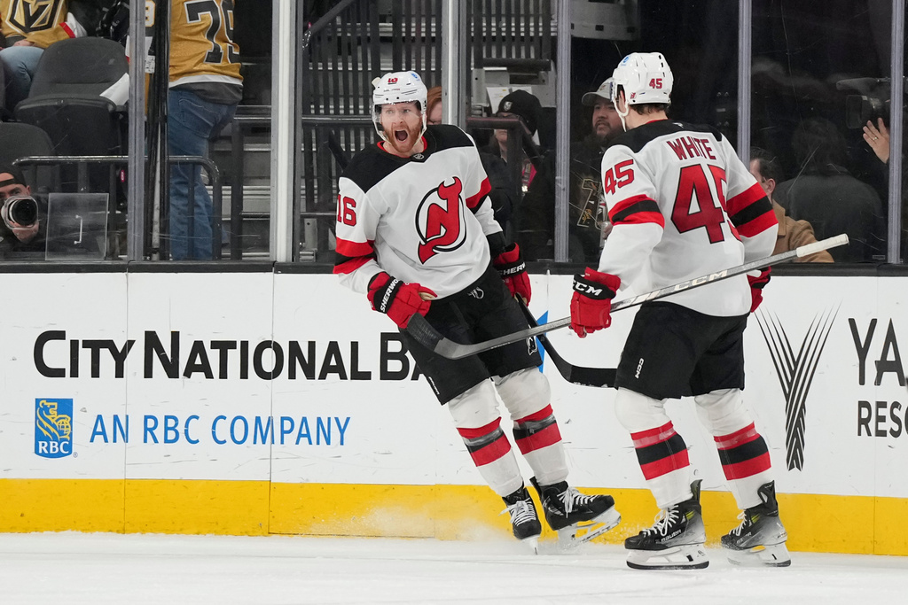 New Jersey Devils right wing Connor Brown (16) celebrates his goal against the Vegas Golden Knights during the second period of an NHL hockey game Wednesday, Dec. 17, 2025, in Las Vegas. (AP Photo/Candice Ward)