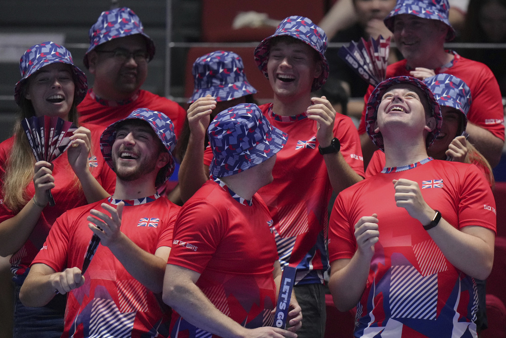 British fans cheer during the Billie Jean King Cup semifinals tennis match between Sonay Kartal, of Britain and Emma Navarro, of the United States, at the Shenzhen Bay Sports Center Arena, in Shenzhen, China's Guangdong province, Saturday, Sept. 20, 2025. (AP Photo/Andy Wong)