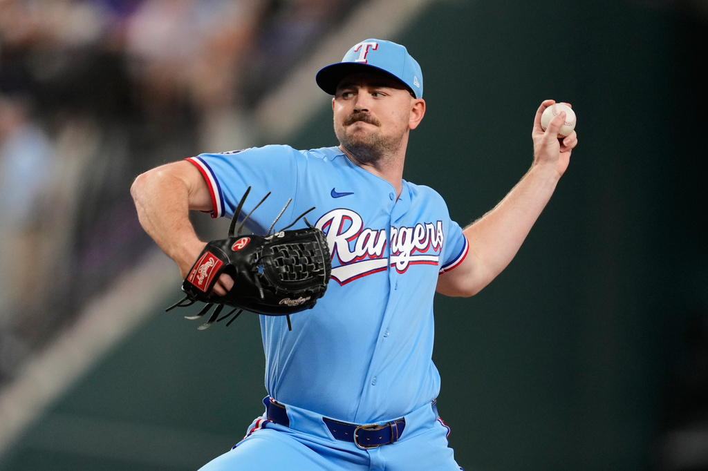 Texas Rangers pitcher Tyler Alexander throws to the Los Angeles Angels in the eighth inning of a baseball game Sunday, Aug. 23, 2026, in Arlington, Texas. (AP Photo/Tony Gutierrez)