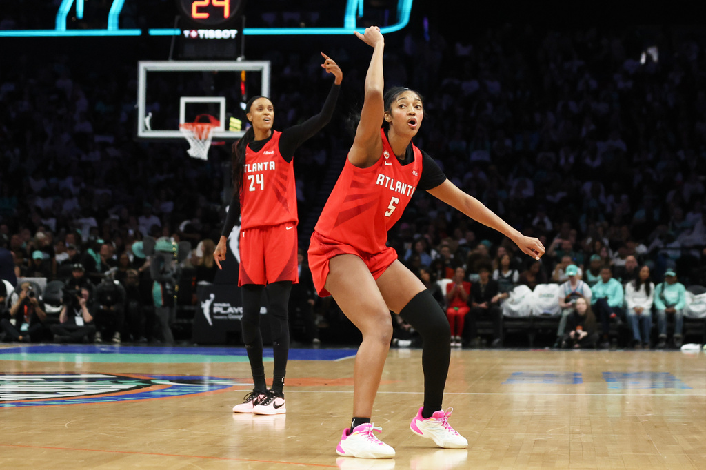 Atlanta Dream forward Angel Reese (5) and DeWanna Bonner (24) ask for a review during the second half of Game 3 of the WNBA basketball semifinals against the New York Liberty, Friday, Oct. 9, 2026, in New York. (AP Photo/Heather Khalifa)