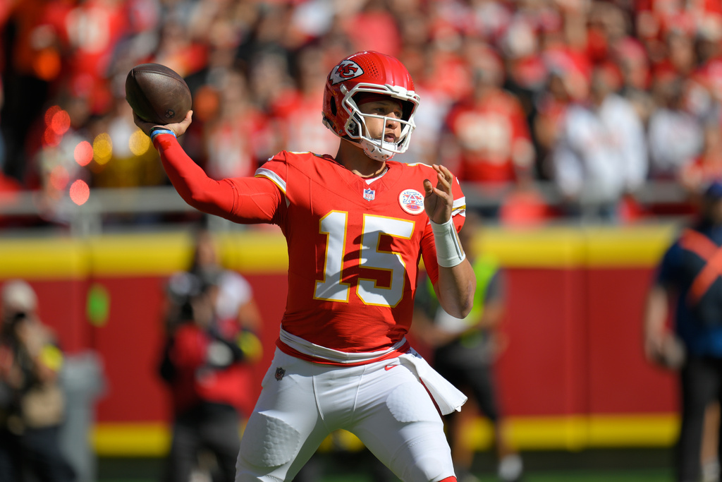 Kansas City Chiefs quarterback Patrick Mahomes throws during the first half of an NFL football game against the Las Vegas Raiders Sunday, Oct. 19, 2025, in Kansas City, Mo. (AP Photo/Reed Hoffmann)
