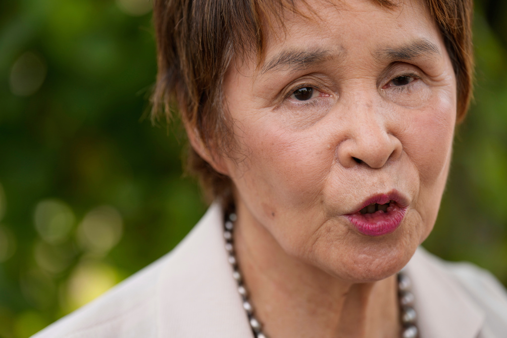 Reiko Muto, a former nurse student, speaks on her experience during an interview with The Associated Press on Wednesday, July 9, 2025, in Hiroshima, western Japan. (AP Photo/Eugene Hoshiko)