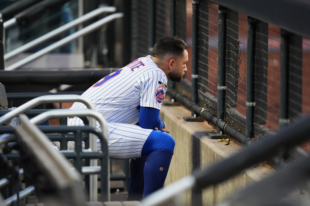 New York Mets' Bo Bichette sits in the dugout after the second baseball game of a doubleheader against the Colorado Rockies, Sunday, April 26, 2026, in New York. (AP Photo/Seth Wenig)